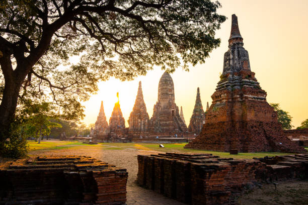 A peaceful morning at Ayutthaya Historical Park reveals ancient temple ruins bathed in golden light, echoing the quiet majesty of Thailand’s former capital.