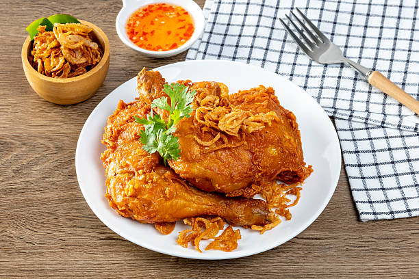 Gai Tod Hat Yai is a famous Southern Thai fried chicken dish, crispy on the outside, juicy inside, and usually served with fried shallots and sticky rice.